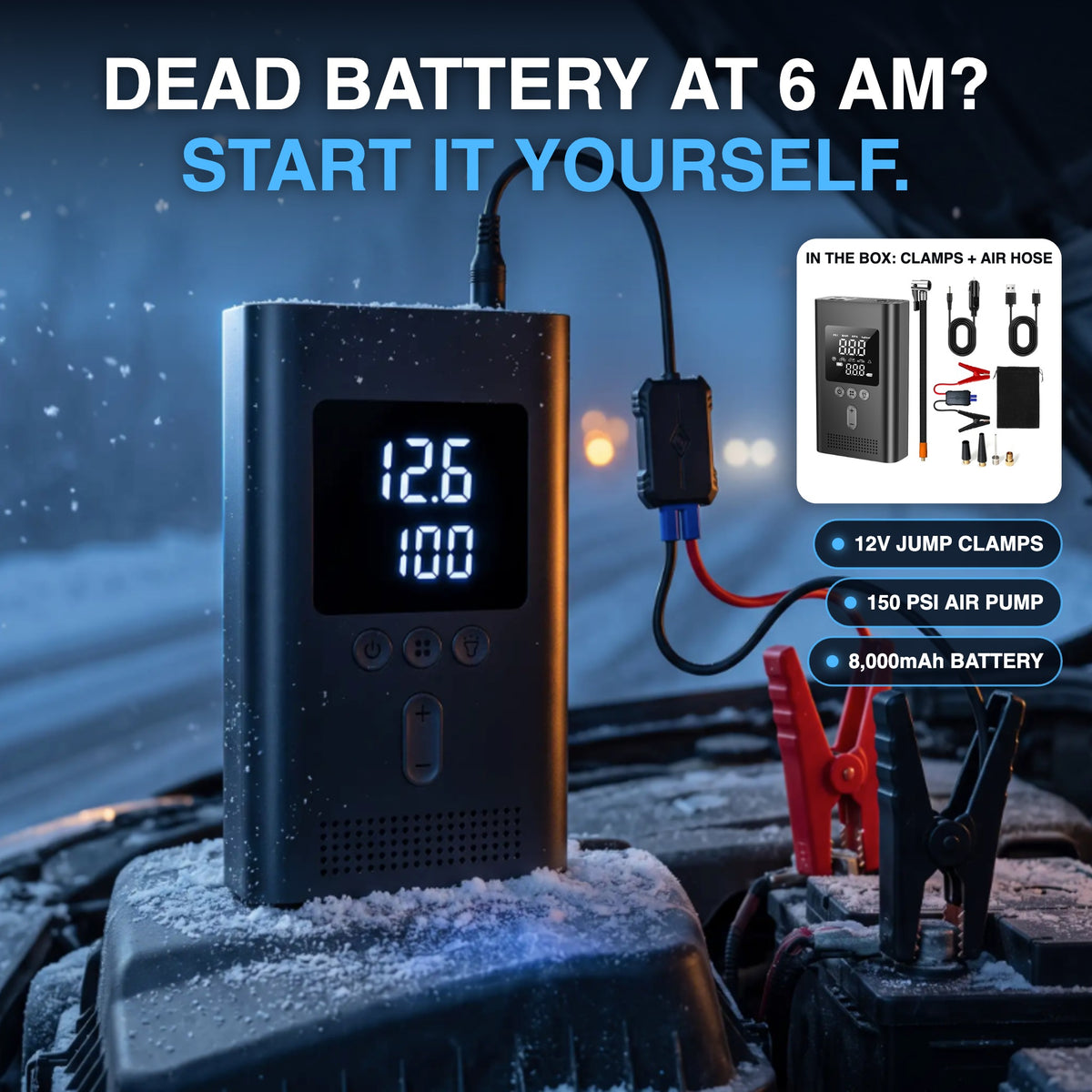 RoadReady jump starter with air compressor clamped to a dead car battery on a snowy morning